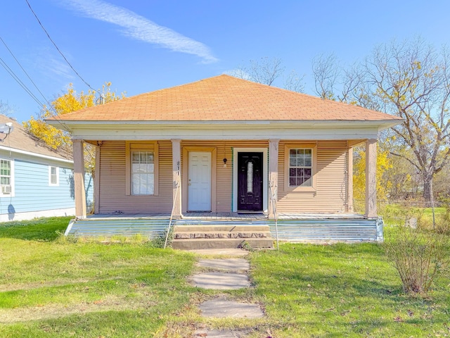 bungalow-style home featuring a porch and a front lawn