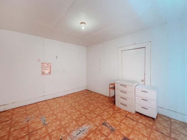 unfurnished room featuring light parquet flooring