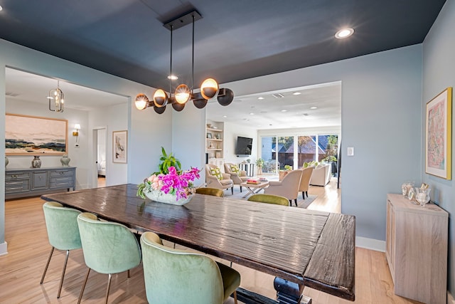 dining room featuring light wood-type flooring