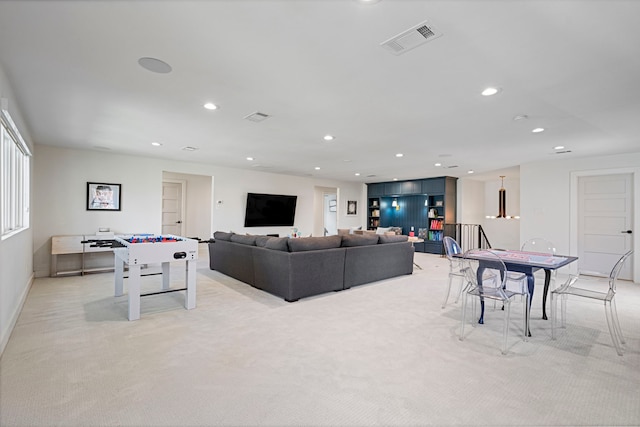 living room with light colored carpet