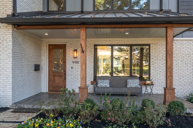 entrance to property with a porch