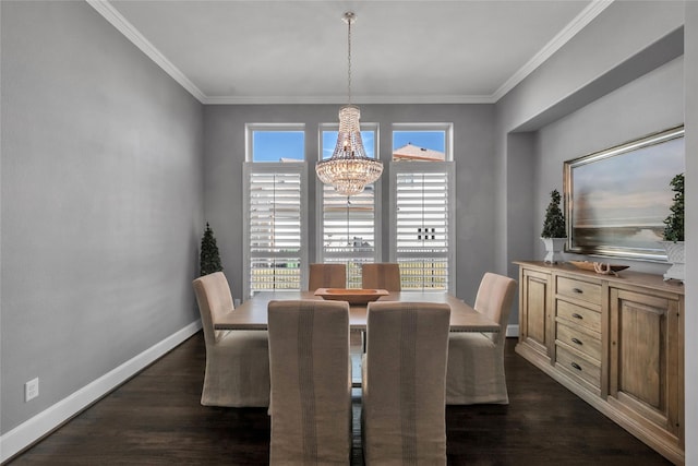 dining room featuring ornamental molding, dark hardwood / wood-style flooring, and a chandelier