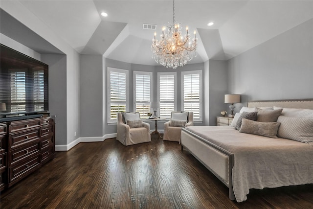 bedroom featuring vaulted ceiling, a notable chandelier, and dark hardwood / wood-style flooring