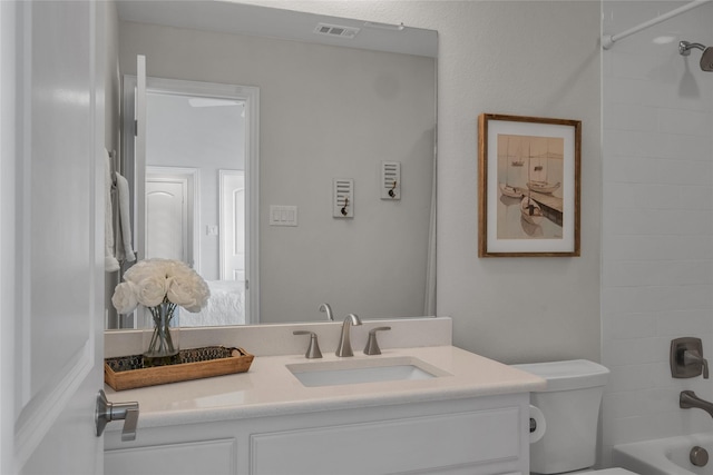 full bathroom featuring vanity, toilet, and shower / bathing tub combination