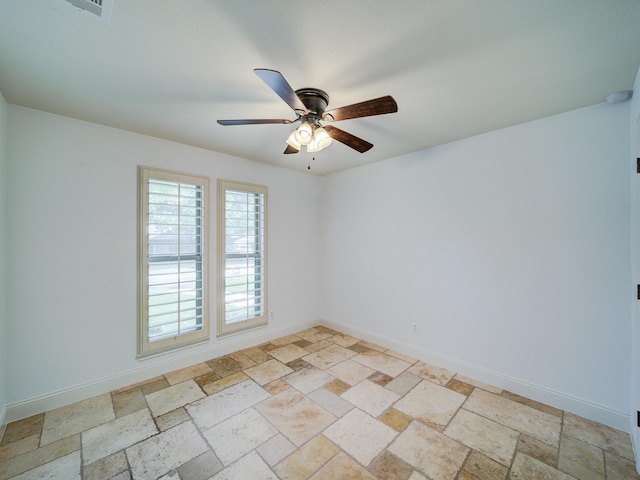 spare room featuring ceiling fan