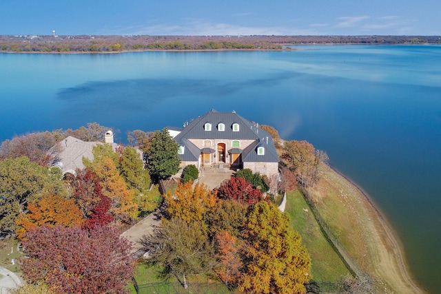 drone / aerial view with a water view