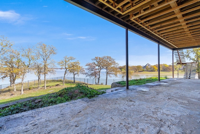 view of patio / terrace with a water view