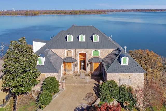 view of front facade with a water view