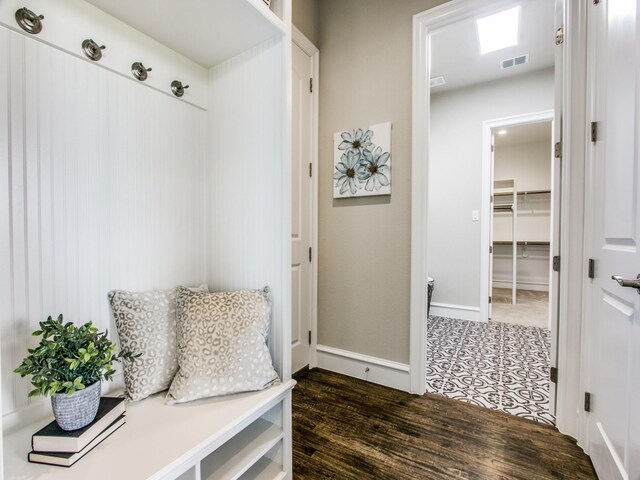 mudroom featuring dark wood-type flooring