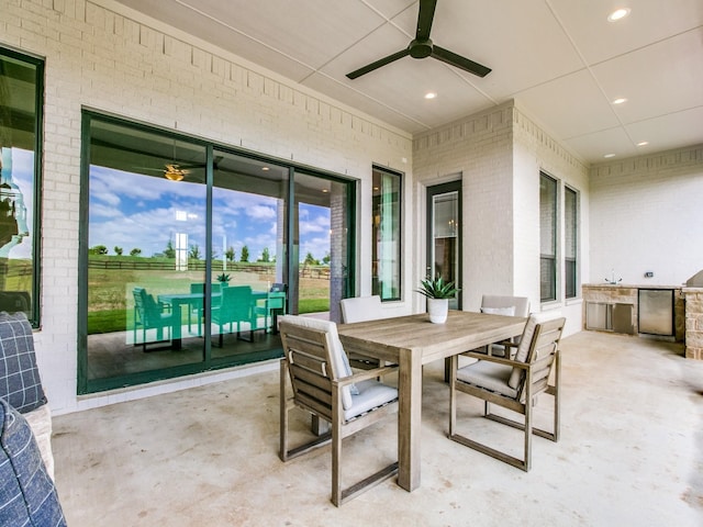 view of patio / terrace featuring ceiling fan and area for grilling