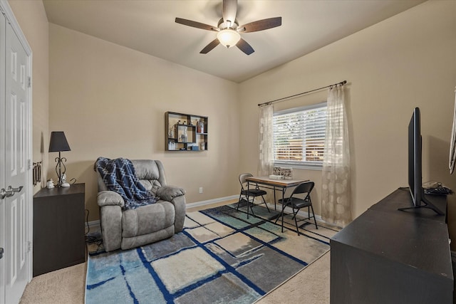 office space featuring light colored carpet and ceiling fan