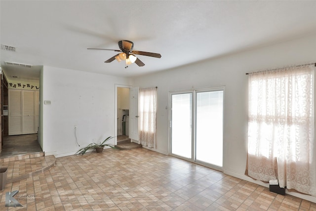 unfurnished room with ceiling fan