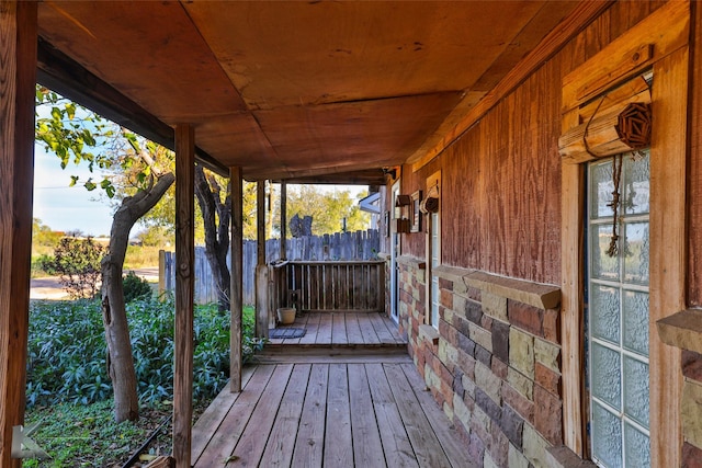 wooden terrace featuring a porch