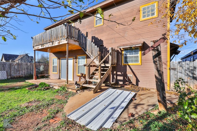 rear view of property with a patio area