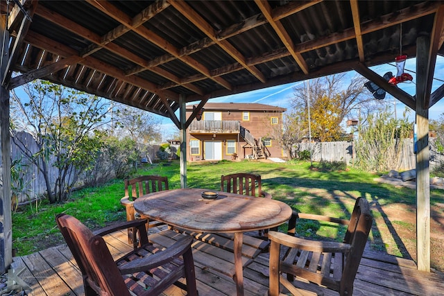 deck featuring a lawn