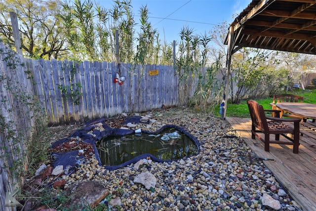 view of yard with a wooden deck