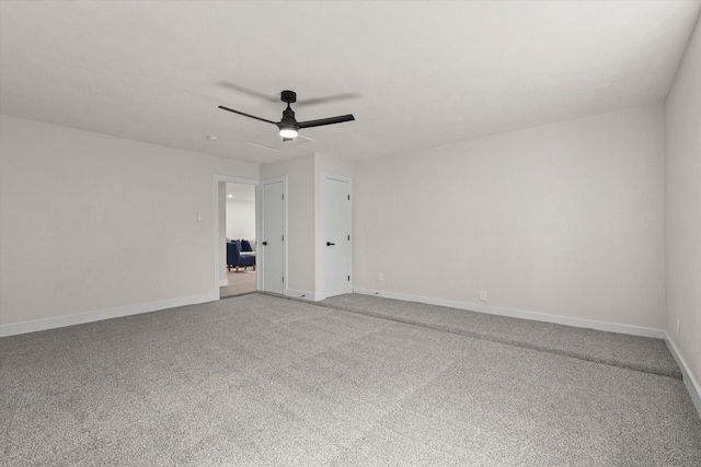 unfurnished room featuring carpet flooring and ceiling fan