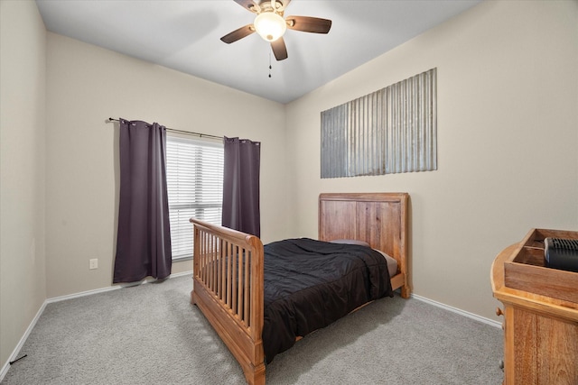 bedroom featuring ceiling fan and light carpet