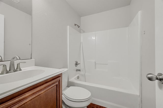 full bathroom with vanity, shower / bathing tub combination, and toilet