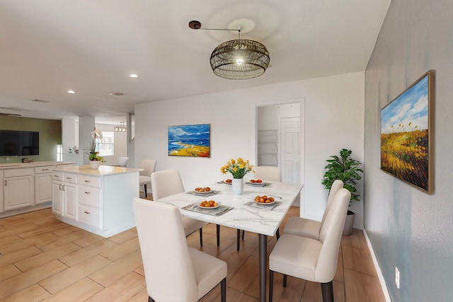 dining room featuring light wood-type flooring