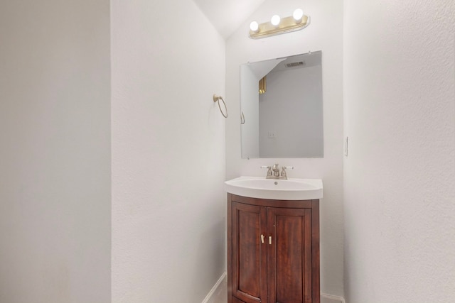 9729 Manassas Rd, Fort Worth, TX 76177 - bathroom featuring vanity and vaulted ceiling