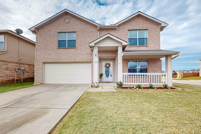 view of front facade featuring a porch, a garage, and a front lawn