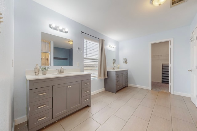 bathroom with vanity and tile patterned floors