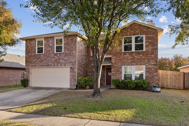 view of front property with a front lawn and a garage