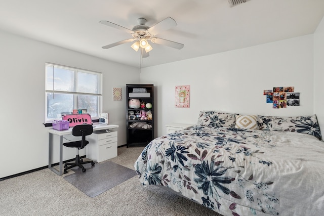 bedroom featuring ceiling fan and light carpet