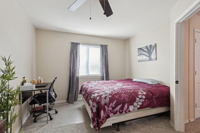 bedroom featuring ceiling fan and carpet floors