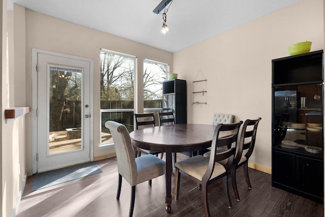 dining space featuring hardwood / wood-style floors