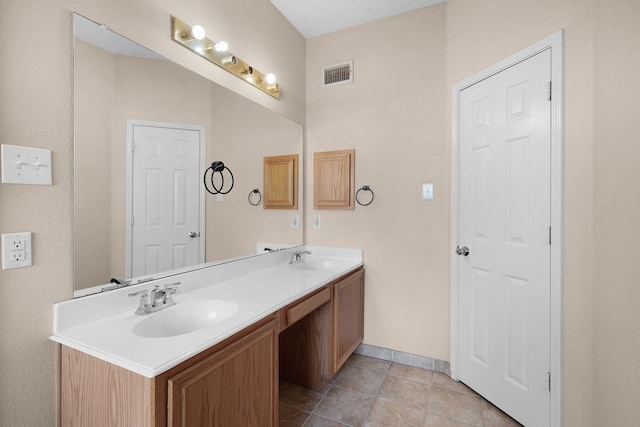 bathroom featuring vanity and tile patterned floors