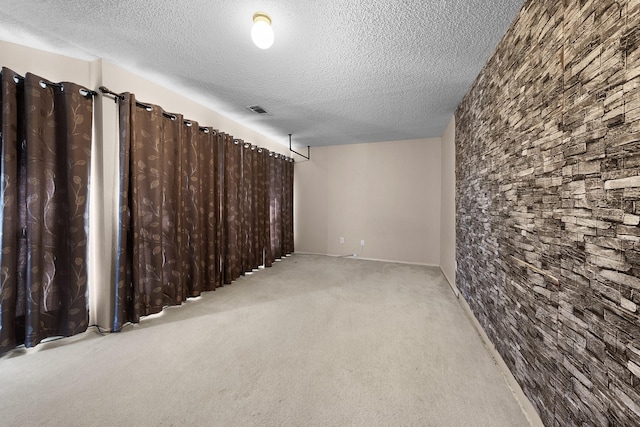 basement featuring light carpet