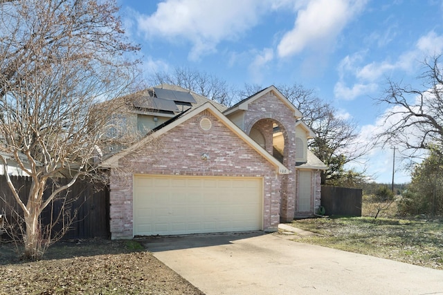 view of front property featuring solar panels