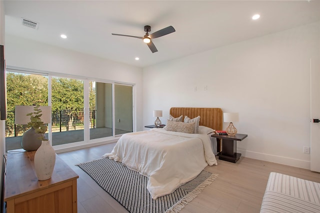 bedroom featuring ceiling fan, access to outside, and light hardwood / wood-style flooring