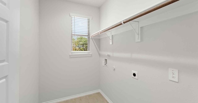 washroom featuring hookup for an electric dryer, gas dryer hookup, and washer hookup