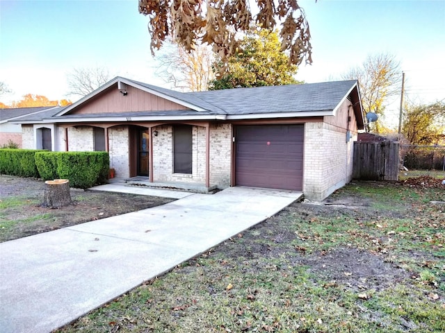 ranch-style home with a garage