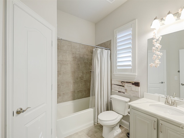 full bathroom featuring tile patterned floors, vanity, toilet, and shower / tub combo