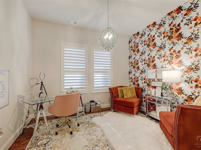 office area featuring a notable chandelier