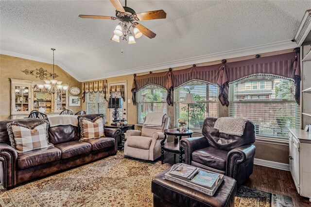 living room featuring a textured ceiling, hardwood / wood-style flooring, crown molding, and lofted ceiling