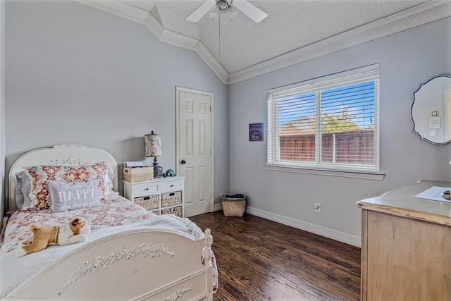 bedroom with lofted ceiling, crown molding, ceiling fan, a textured ceiling, and dark hardwood / wood-style flooring