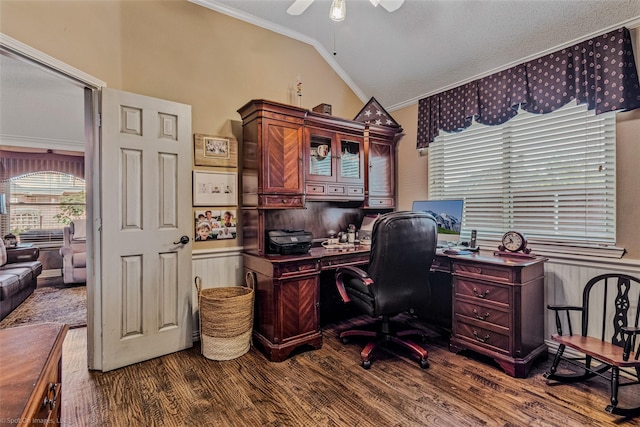 home office featuring crown molding, ceiling fan, dark wood-type flooring, and vaulted ceiling