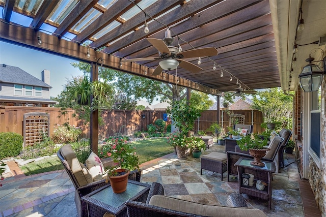 view of patio / terrace with a pergola, ceiling fan, and an outdoor hangout area