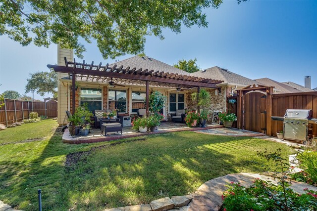 rear view of property with a lawn, outdoor lounge area, a pergola, ceiling fan, and a patio area