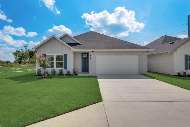 ranch-style home with a front lawn and a garage