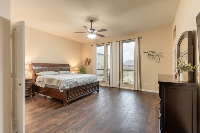 bedroom with access to exterior, ceiling fan, and dark hardwood / wood-style flooring