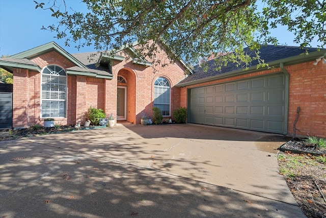 view of front of property featuring a garage