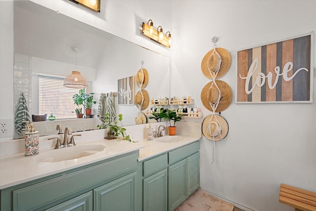 bathroom featuring vanity and vaulted ceiling