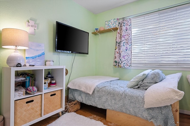 bedroom featuring dark wood-type flooring