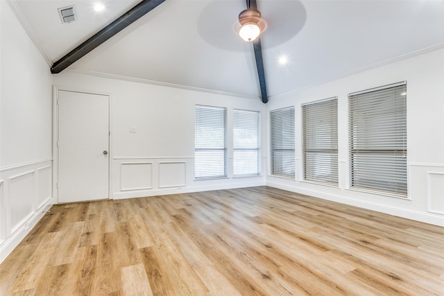 empty room with vaulted ceiling with beams, ceiling fan, crown molding, and light hardwood / wood-style floors